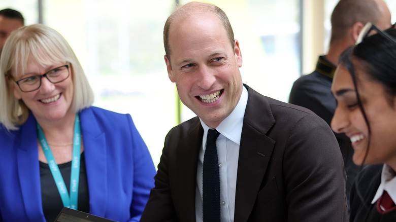 Prince William smiling during public engagement