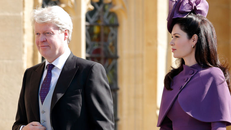 Charles Spencer walking alongside Karen Spencer