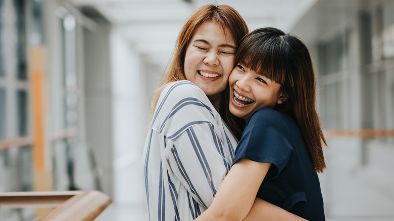 Friends hugging each other