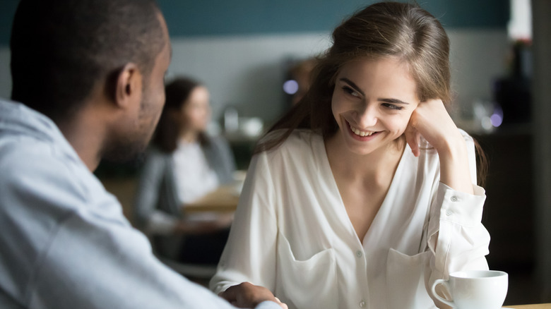 woman smiling at man