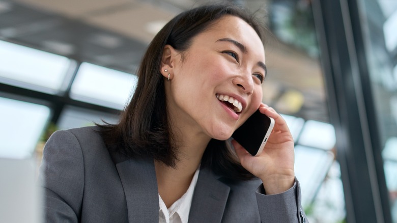 woman happy phone