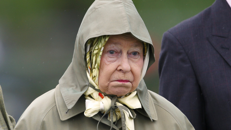 Queen Elizabeth in rain