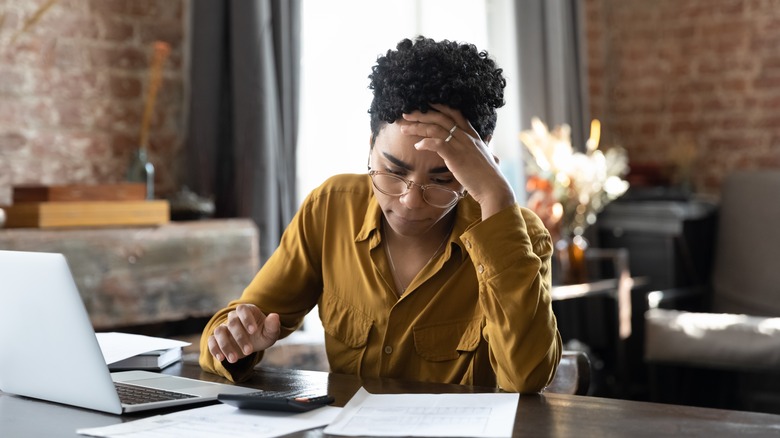 Woman feeling frustrated at work