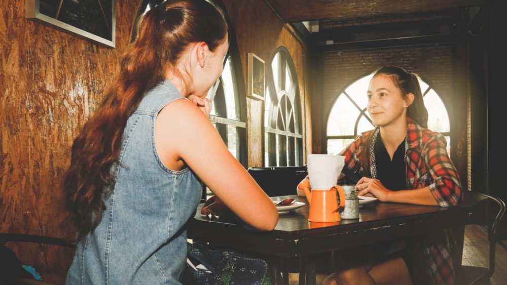 Women talking in a quiet corner