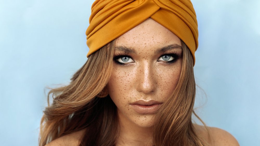 Woman with freckles on her face