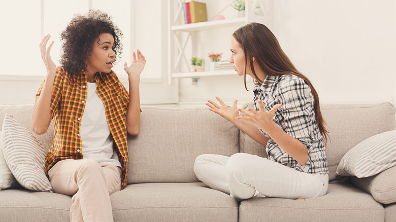 women angry with each other, arguing