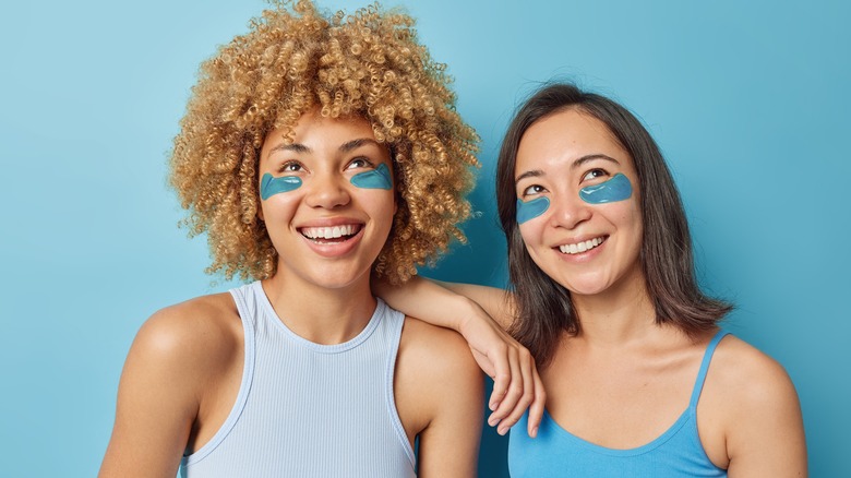 Two women with silicone patches smiling