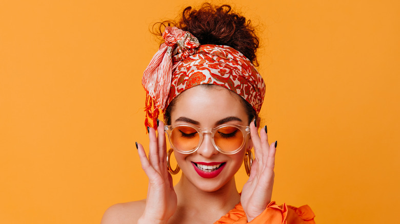 Women wearing silk scarf