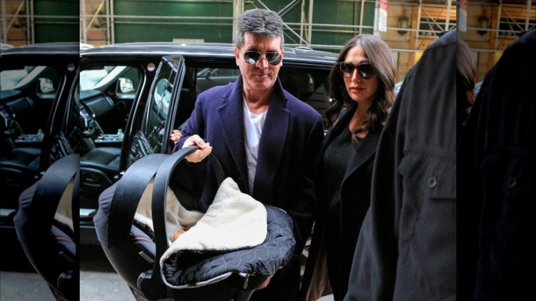 Simon Cowell and Lauren Silverman with baby son