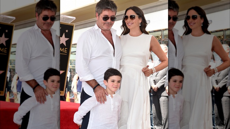 Simon Cowell, Lauren Silverman, and Eric Cowell on the red carpet