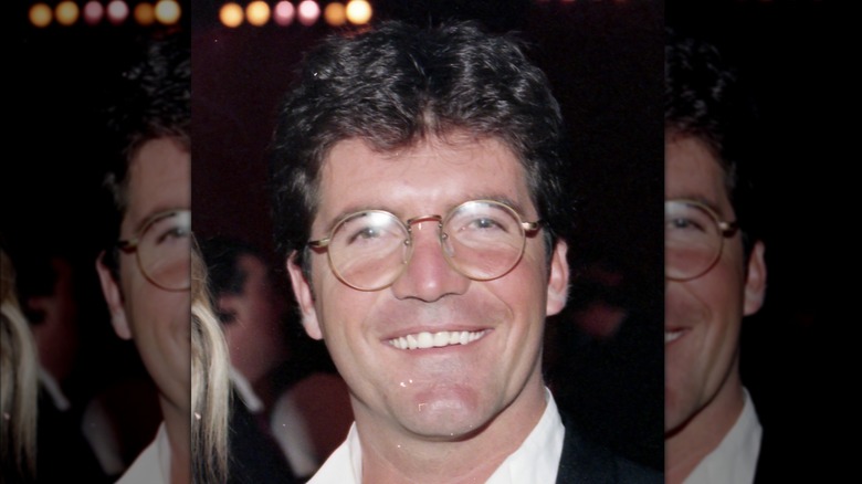 Simon Cowell smiling in 1994