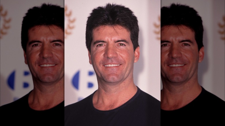 Simon Cowell smiling in 2001