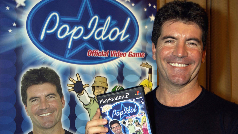 Simon Cowell with Pop Idol video game