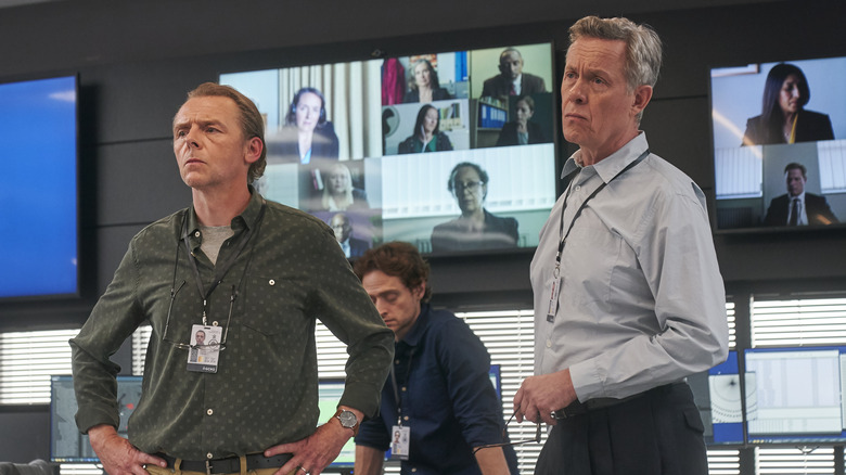 Simon Pegg and Alex Jennings standing in The Undeclared War