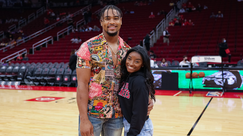 Jonathan Owens and Simone Biles smiling