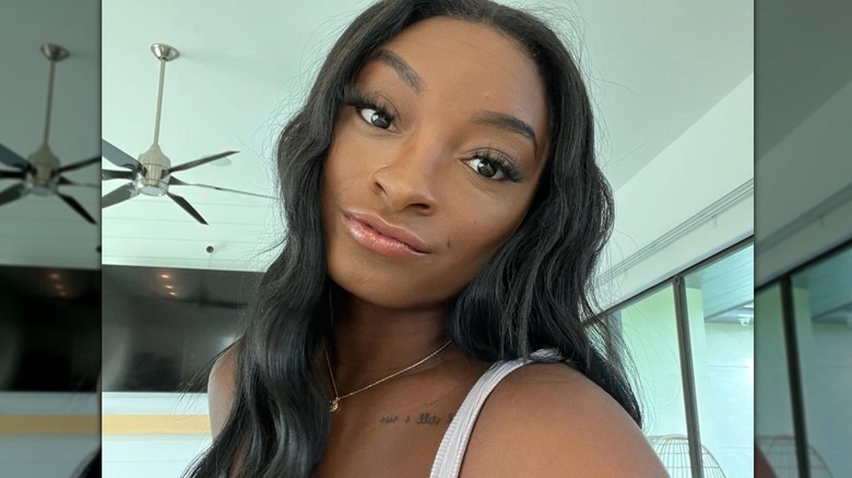 Simone Biles posing for a selfie