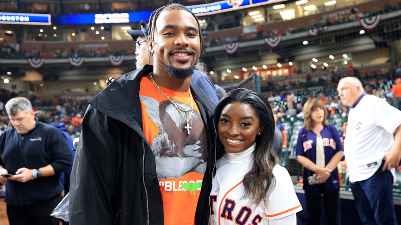 Jonathan Owens and Simone Biles smiling together