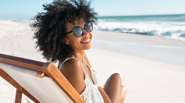 woman on chair at the beach