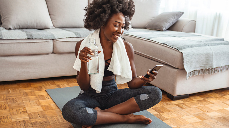 A woman on a yoga mat