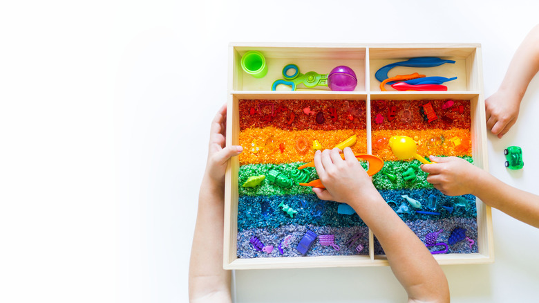 A rainbow rice sensory table