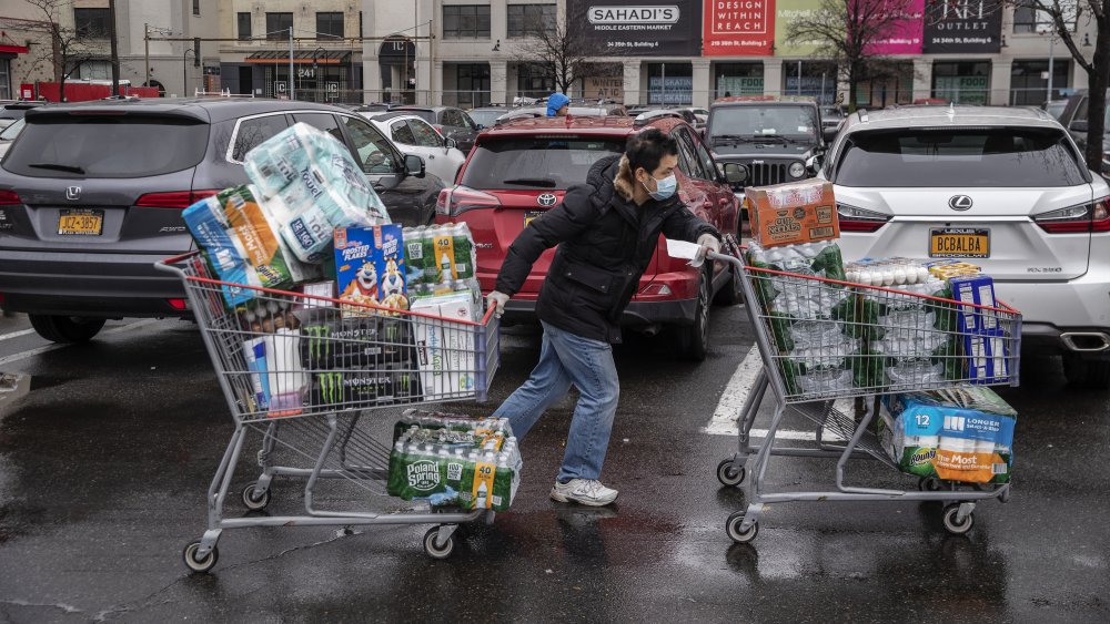 People buying lots of stuff at Costco