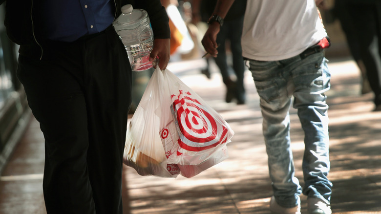 People carrying a bag from Target