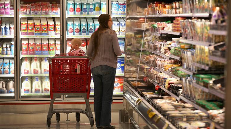 A mother shopping at Target with her baby