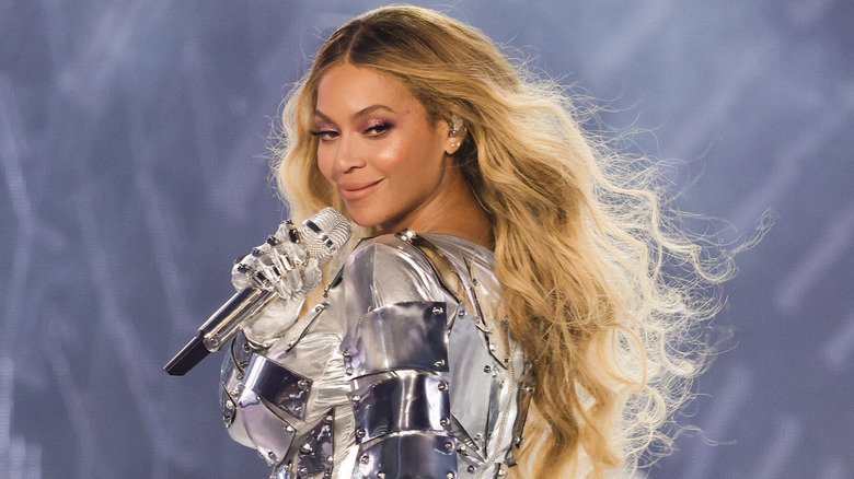 Beyoncé looking over her shoulder and smiling