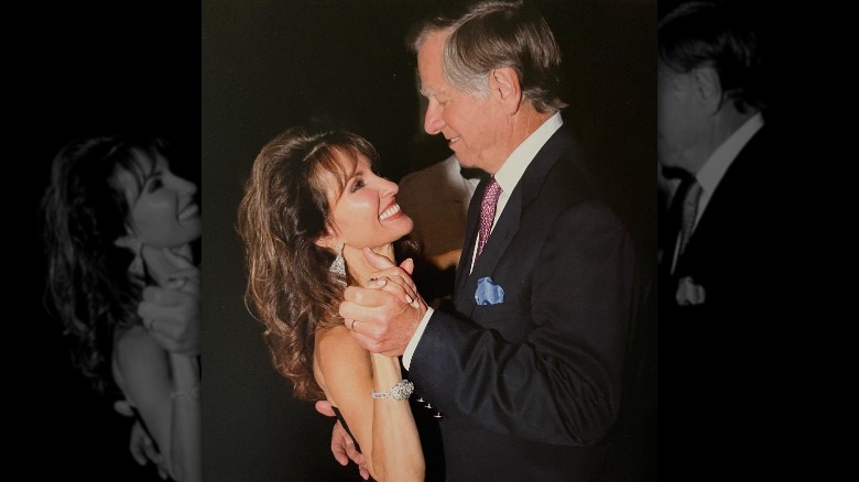 Susan Lucci and Helmut Huber smiling at each other