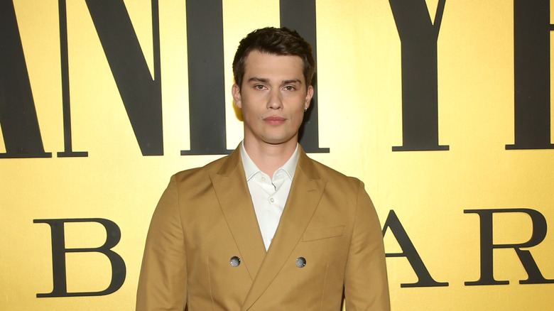 Nicholas Galitzine posing at Vanity Fair event 