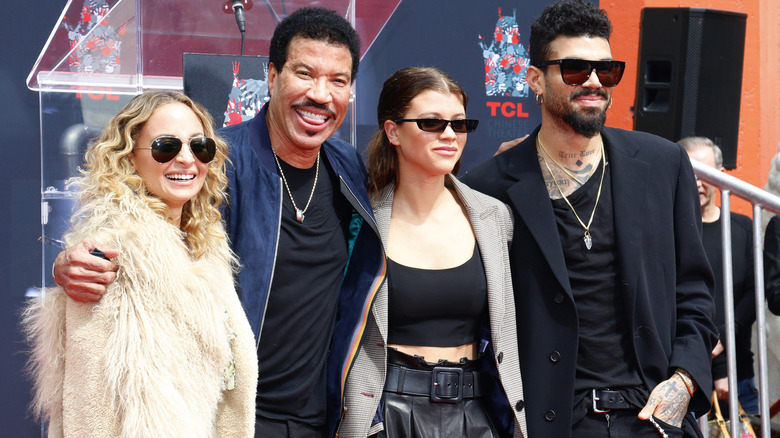 Nicole Richie, Lionel Richie, Sofia Richie, and Miles Richie posing