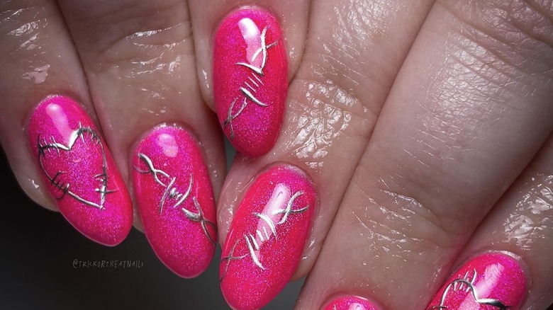 Hot pink nails with silver