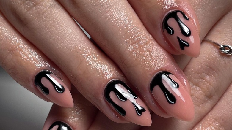 Nude nails with black drips