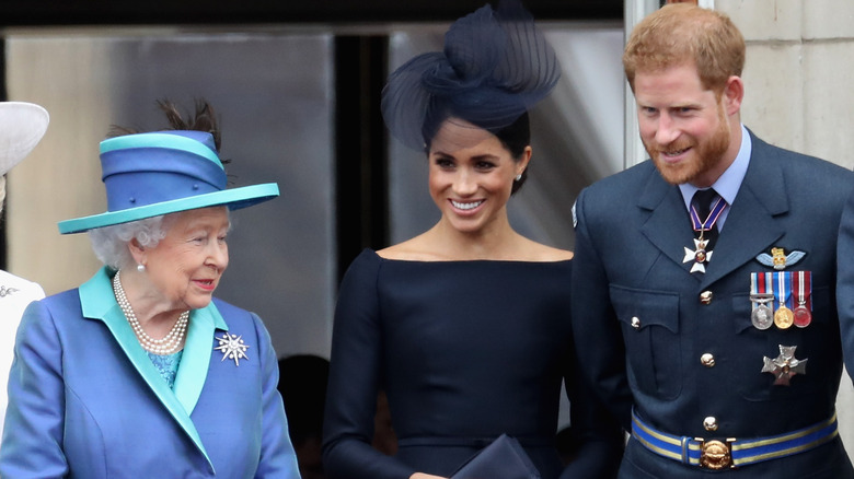 Meghan and Harry with the Queen 