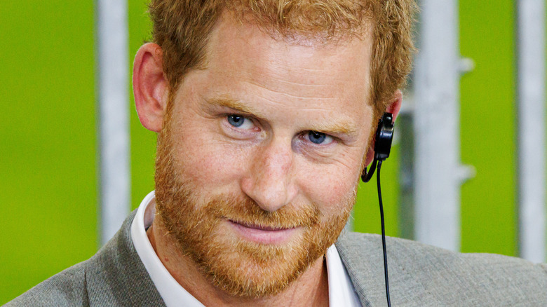 Prince Harry smiles knowingly