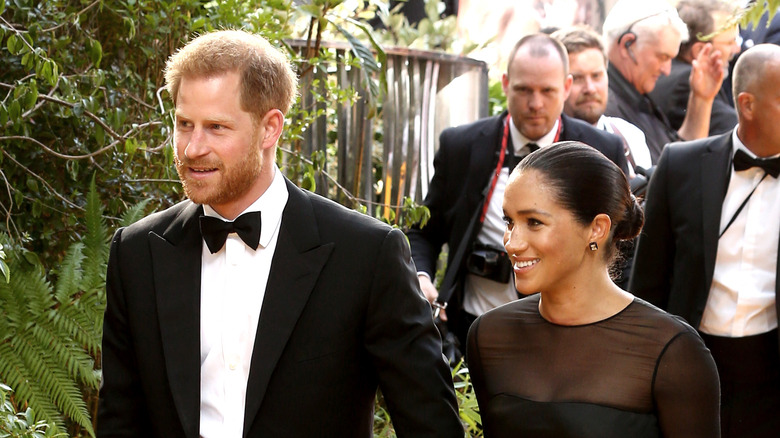 Prince Harry walking with Meghan Markle