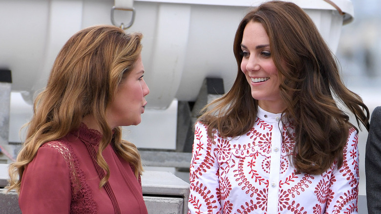 Sophie Gregoire Trudeau talking with Kate Middleton