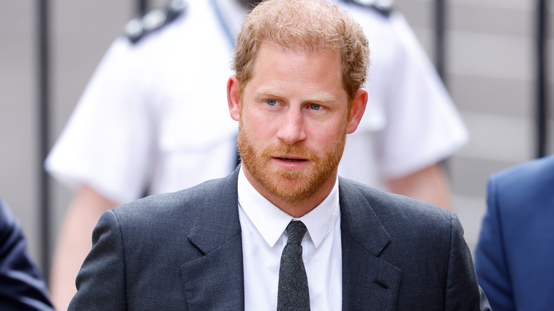 Prince Harry posing with slightly open mouth