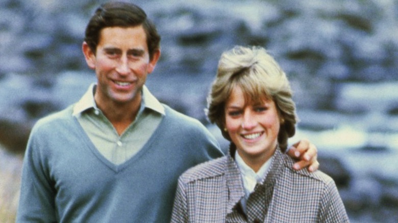 Young King Charles and Princess Diana smiling