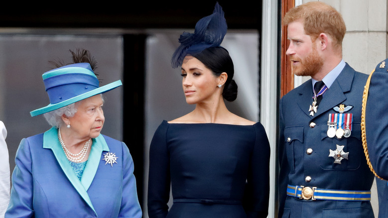 Queen Elizabeth II, Meghan Markle, and Prince Harry