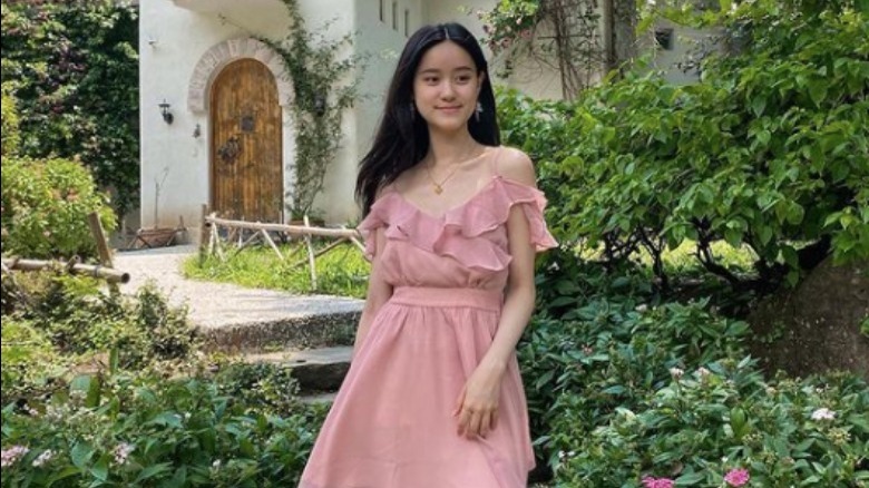 Girl in pretty pink dress