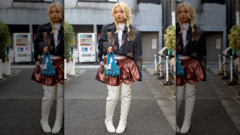 woman wearing boxy cropped jacket