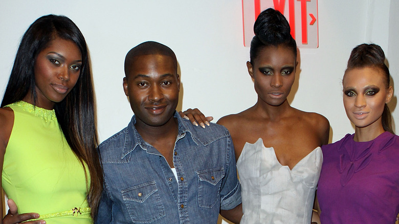 Mychael Knight and supermodels after his 2012 fashion show