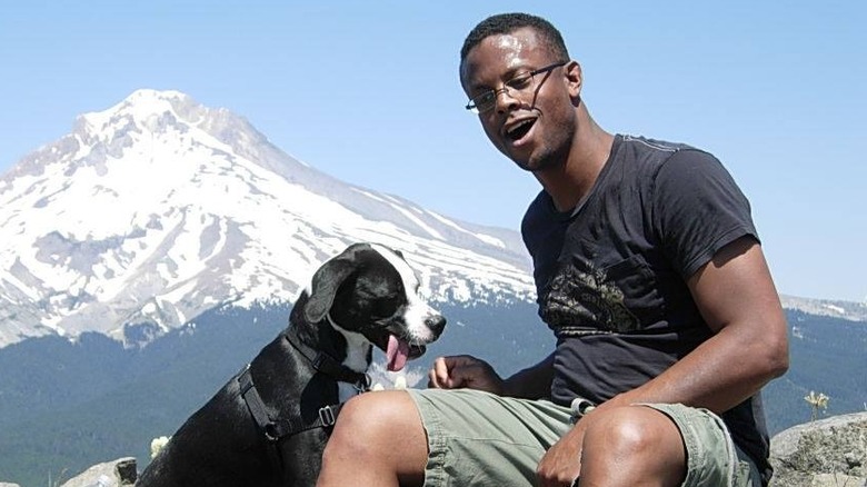 Sean Sasser outside with dog