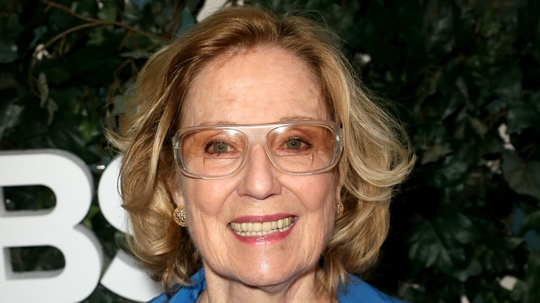 Elizabeth Hubbard smiling, wearing glasses