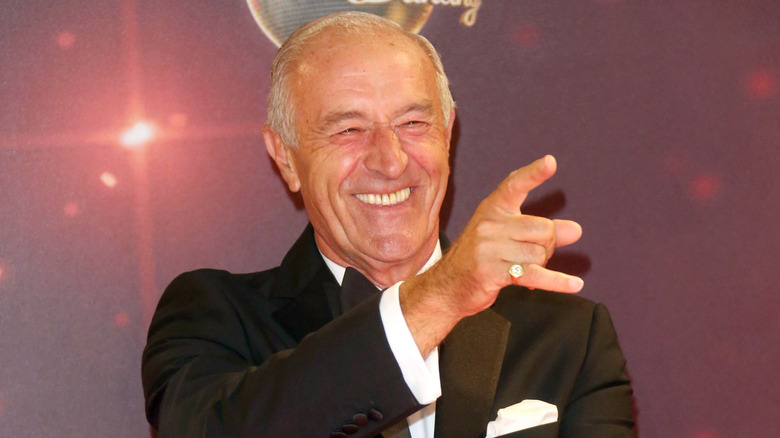 Len Goodman laughing and pointing