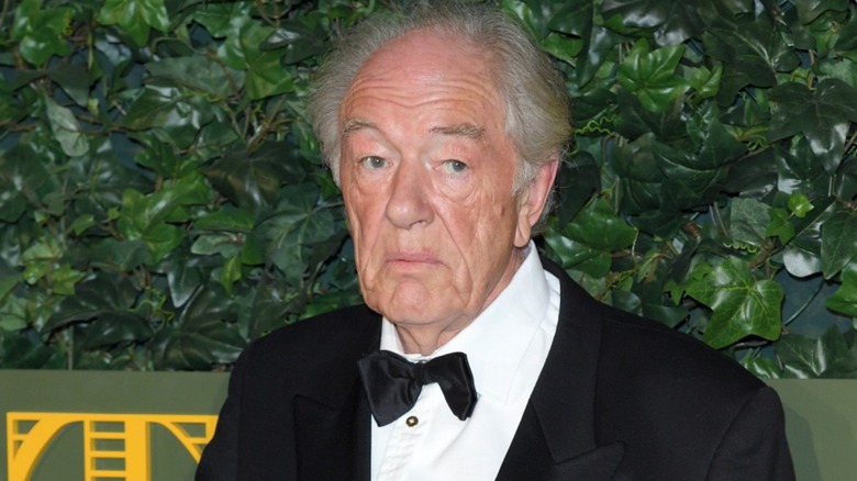 Michael Gambon shrugging