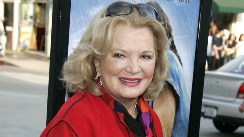 Gena Rowlands smiling, sunglasses in hair