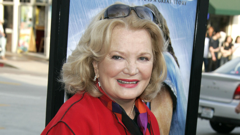 Gena Rowlands smiling, sunglasses in hair