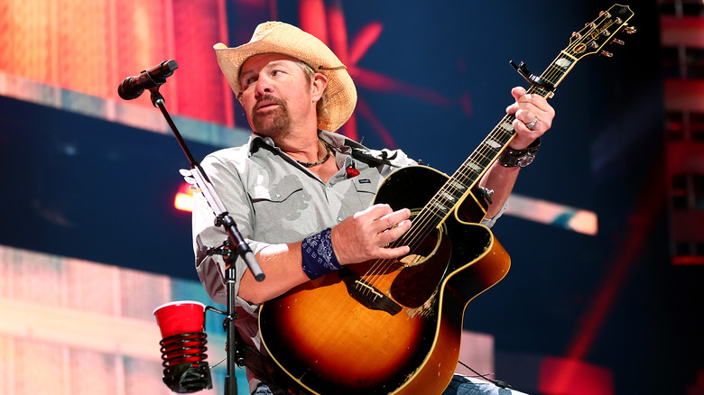 Toby Keith playing guitar